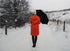 Red Coat on a Snowy Path